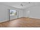 Inviting living room with hardwood floors and natural light at 9461 Se 173Rd Ln, Summerfield, FL 34491