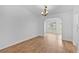 Bright living room featuring hardwood floors and ample natural light at 9461 Se 173Rd Ln, Summerfield, FL 34491