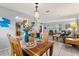 Open dining area with views into the living room and kitchen, perfect for gatherings and Gathering meals at 9752 County Road 121, Wildwood, FL 34785