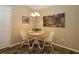 Inviting dining area with a round table, perfect for casual meals at 1070 Pinewood Pl, The Villages, FL 32162