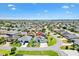 An aerial view showcases the home's location within a sprawling residential community at 1182 Allaire Loop, The Villages, FL 32163