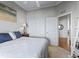 Bedroom with ensuite featuring a closet and view to entryway at 11820 Se 178Th St, Summerfield, FL 34491