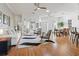 Spacious living area with hardwood floors, leading to a dining space at 11820 Se 178Th St, Summerfield, FL 34491