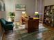 Comfortable office with desk, chair, and lots of natural light at 1231 Merion Dr, Mount Dora, FL 32757