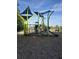 Modern playground with climbing structures, slides, and swings, perfect for Gathering fun and outdoor activities at 1231 Merion Dr, Mount Dora, FL 32757