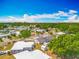 Aerial shot showcasing the community's layout with neat streets, trees, and well-placed homes at 1236 Elkhart Cir, Tavares, FL 32778
