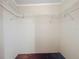Walk-in closet with wall-mounted shelves for easy storage and organization at 1236 Elkhart Cir, Tavares, FL 32778