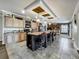 Spacious kitchen featuring a large center island, ample counter space, and modern appliances at 1236 Elkhart Cir, Tavares, FL 32778