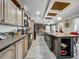 Spacious kitchen featuring an island, recessed lighting, and modern appliances at 1236 Elkhart Cir, Tavares, FL 32778