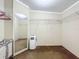 Large walk-in closet with shelving and ample storage space for clothing and accessories at 1236 Elkhart Cir, Tavares, FL 32778