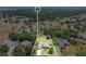Aerial view of property showcasing the layout, landscaping, and surrounding neighborhood at 13336 Biscayne Dr, Grand Island, FL 32735