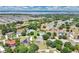 Aerial view of a residential area close to a lake and natural surroundings at 13336 Biscayne Dr, Grand Island, FL 32735