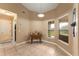 Breakfast nook with table and large windows that provide plenty of natural light at 13336 Biscayne Dr, Grand Island, FL 32735