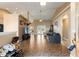 Inviting living area with tile floors, high ceilings, flowing into dining space and large doorways at 13336 Biscayne Dr, Grand Island, FL 32735