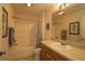 Clean bathroom featuring a tub and shower combo, a toilet, and a single sink vanity at 1482 Azteca Loop, The Villages, FL 32162