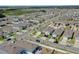 Planned community, highlighting the neighborhood layout and streetscape, with uniform housing styles and green spaces at 1548 Planters Point Rd, Kissimmee, FL 34744