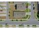 Aerial view highlighting the home's location near crosswalks and the layout of the neighborhood's street design at 1548 Planters Point Rd, Kissimmee, FL 34744