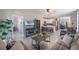 Open-concept living space blending kitchen, dining, and living areas for seamless entertainment at 1548 Planters Point Rd, Kissimmee, FL 34744