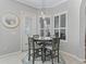 Cozy breakfast nook with pendant lighting and shuttered windows at 17471 Se 110Th Ter, Summerfield, FL 34491