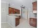 Well-lit kitchen featuring a breakfast bar and modern stainless appliances at 17471 Se 110Th Ter, Summerfield, FL 34491