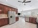 Spacious kitchen features stainless steel appliances, light countertops, and an open layout at 17471 Se 110Th Ter, Summerfield, FL 34491