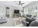 Comfortable living room with large windows and ample natural light at 17471 Se 110Th Ter, Summerfield, FL 34491