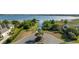 Expansive waterfront community with lush greenery and docks on the lake, showcasing prime real estate at 19627 Spring Oak Dr, Eustis, FL 32736
