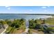 Expansive waterfront community with lush greenery and docks on the lake, showcasing prime real estate at 19627 Spring Oak Dr, Eustis, FL 32736
