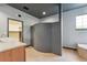 Modern bathroom with curved privacy partition, unique bowl sink, and walk in closet at 19627 Spring Oak Dr, Eustis, FL 32736