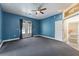 Spacious bedroom with an ensuite and french door access at 19627 Spring Oak Dr, Eustis, FL 32736