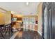 Open-concept foyer with views of the kitchen, living room, and outdoor patio at 19627 Spring Oak Dr, Eustis, FL 32736
