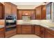 Close up on kitchen with custom cabinetry and stainless steel appliances at 19627 Spring Oak Dr, Eustis, FL 32736