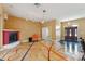 Open living space with fireplace and unique floor, leading to front entryway at 19627 Spring Oak Dr, Eustis, FL 32736
