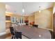 Open living area seamlessly connects the kitchen, dining, and living spaces at 19627 Spring Oak Dr, Eustis, FL 32736