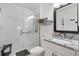 Updated bathroom featuring a glass-enclosed shower and modern vanity with granite countertop at 2015 Palo Alto Ave, The Villages, FL 32159