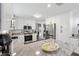 Well-equipped kitchen boasting stainless steel appliances, granite countertops, and ample cabinet space at 2015 Palo Alto Ave, The Villages, FL 32159