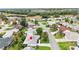 Scenic aerial view of home nestled in a tranquil community with nearby amenities at 2022 Claudio Ln, The Villages, FL 32159