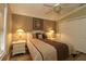 Comfortable bedroom featuring a ceiling fan, soft lighting and closet at 2039 Thurmond Ave, The Villages, FL 32162