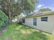 Expansive backyard view with mature trees and well-kept lawn at 2131 Burley Ave, Clermont, FL 34711
