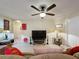 Comfortable living room with a television, accent lighting, and cozy seating at 2131 Burley Ave, Clermont, FL 34711