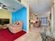 Open-concept living space with casual seating, offering seamless flow and room to relax at 2131 Burley Ave, Clermont, FL 34711