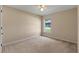 Bedroom with neutral carpet, one window and ceiling fan at 22217 Caledonia Dr, Leesburg, FL 34748