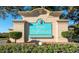 Royal Highlands community sign featuring colorful flowers and manicured bushes at 22217 Caledonia Dr, Leesburg, FL 34748