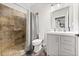 Bathroom featuring a glass enclosed shower and modern vanity at 28924 Discovery Rd, Tavares, FL 32778