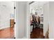 Walk-in closet with wood floors, custom shelving, and bright lighting at 28924 Discovery Rd, Tavares, FL 32778