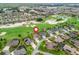 Gorgeous aerial view of a home on a golf course community near shopping and recreation at 2954 Cedar Grove Loop, The Villages, FL 32163