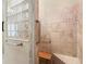 Accessible shower stall featuring multiple grab bars, a built-in seat, and decorative tile at 2954 Cedar Grove Loop, The Villages, FL 32163