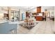 Open dining area connects to the kitchen with access to outdoor patio through sliding glass doors at 307 Water Shore Dr, Leesburg, FL 34748