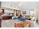 Spacious living room with an open floor plan and easy access to the kitchen at 307 Water Shore Dr, Leesburg, FL 34748