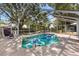 Enclosed pool featuring colorful floats under a screened patio at 307 Water Shore Dr, Leesburg, FL 34748
